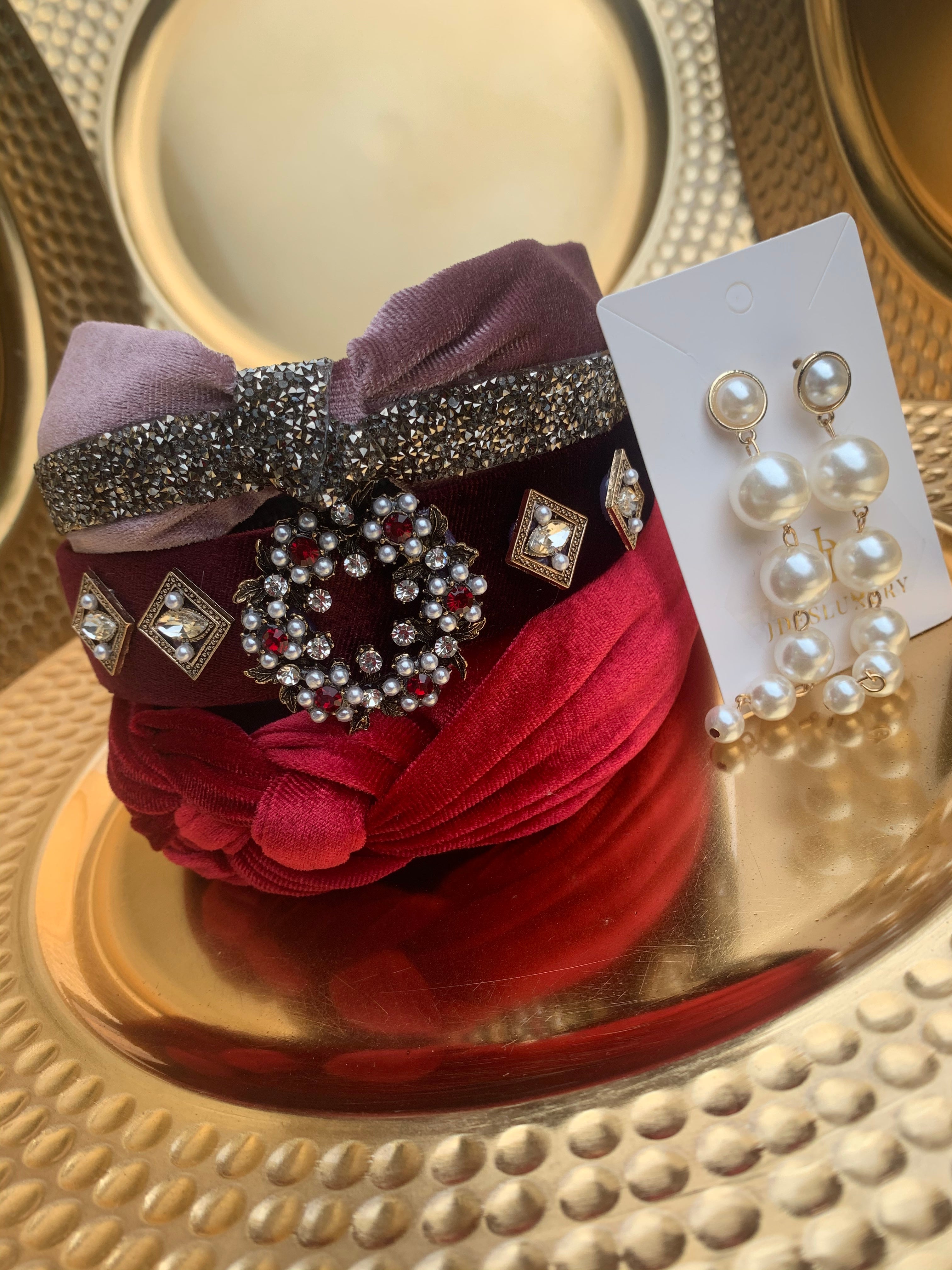 4 pieces set. 3 headband 1 pair of earring.