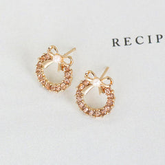 Pearl bow metal stud earrings